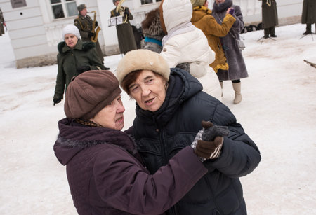 St. Petersburg, Russia - February 8, 2015: Dance floor for the elderly in the city park. People dance to the music of a brass band.のeditorial素材