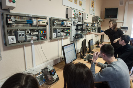 St. Petersburg, Russia - February 15, 2012: International Scientific and Educational Center of Schneider electric. Students learn in a classroom electrical equipment.のeditorial素材
