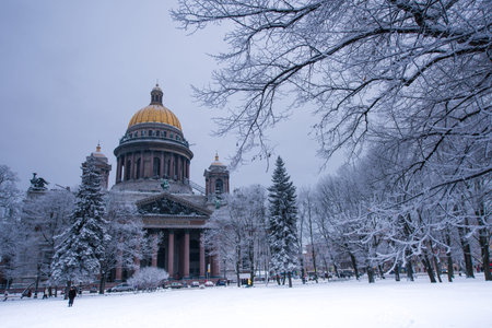 St. Isaac's Cathedral in the winter night on a cold day. Trees in the snow and frost. Attraction of the city, St. Petersburg, Russiaの写真素材