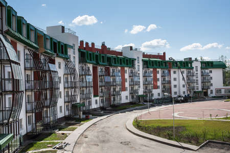 Leningrad, Russia - June 29, 2015: Country residential complex economy class on completing the construction phase on a sunny summer dayのeditorial素材