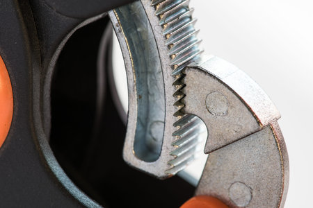 metal ratchet clamp a plastic - tool carpenter, macro