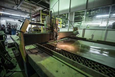 Saint-Petersburg, Russia - November 16, 2016: The process of waterjet cutting sheet steel in the...