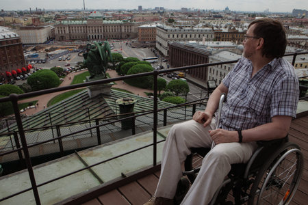 Saint-Petersburg, Russia - May 22, 2014: In St. Isaac's Cathedral is equipped with a ramp for lifting on a specially made for wheelchair users viewing the tourist areaのeditorial素材