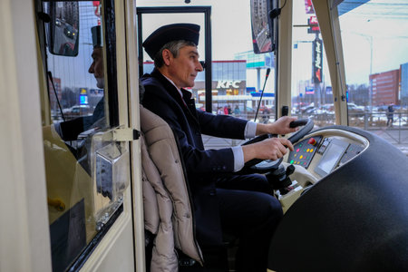 St. Petersburg, Russia - December 12, 2017: Launch of the first hybrid bus-trolleybus. The driver is...
