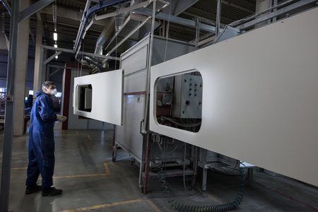 St. Petersburg, Russia - June 26, 2016: Line of automatic painting of doors of subway cars and trains at the plant where components are made for the plants of transport engineeringのeditorial素材