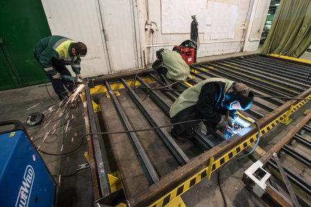 St. Petersburg, Russia - June 29, 2016: Shop assembly of metal frames for the subway cars. Welders...