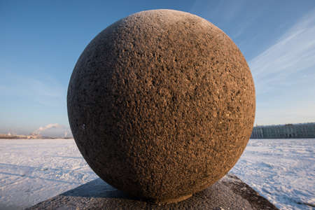 St. Petersburg. Russia. Sculpture - a granite ball in the historical center of the city - a favorite place for pedestrian walks of citizens and tourists.の写真素材