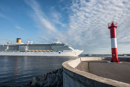St. Petersburg, Russia - June 29, 2016: Cruise ship COSTA LUMINOSA in the waters of the Gulf of Finland near lighthouse of fort Constantineのeditorial素材