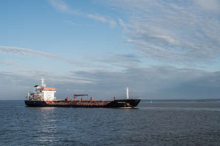 St. Petersburg, Russia - June 29, 2016: ship barge BALTIC EAGLE in the Finnish Gulf of the Baltic Sea against a blue sky, unloadedのeditorial素材