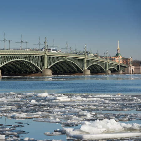 St. Petersburg, Russian Federation - April 12, 2018: The Troitsky bridge across the Neva river during the ice drift on a clear spring dayのeditorial素材