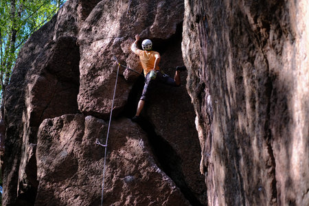 Leningrad region, Russia - June 23, 2018: Climbers during training sessions on overcoming rocky...