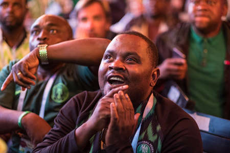 St. Petersburg, Russia - June 26, 2018: Fans of the national football teams during the match between Argentina and Nigeria watch the game on TV in the fan zone near the stadium Zenit Arena.のeditorial素材