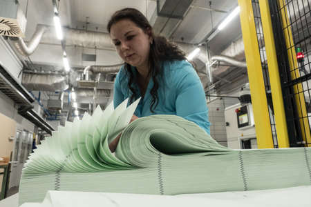 St. Petersburg, Russia - August 30, 2018: Printing workshop of the Mint. Manufacturing of high-tech products from special paper. Accounting and warehousing of products.のeditorial素材