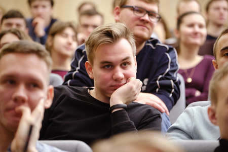 St. Petersburg, Russia - February 18, 2018: Students of the Polytechnic University at a lecture. Listen carefully. Close up of face. Higher education.のeditorial素材