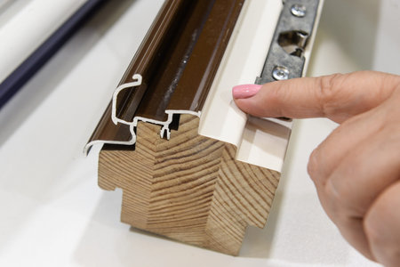 demonstration of opening and closing of plastic and wooden windows on a sample of profiles....