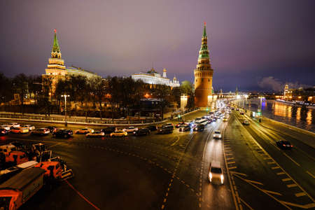 Moscow, Russia - December 8, 2018: View of the Moscow Kremlin and the Moscow River on a winter evening. On the river navigation ships. Ice, sludge. Bright illumination.のeditorial素材