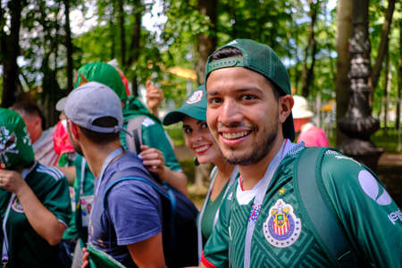 St. Petersburg, Russia - July 14, 2018: Football fans before the match of Belgium and England for third place on a fine sunny day. Joy, fun.のeditorial素材