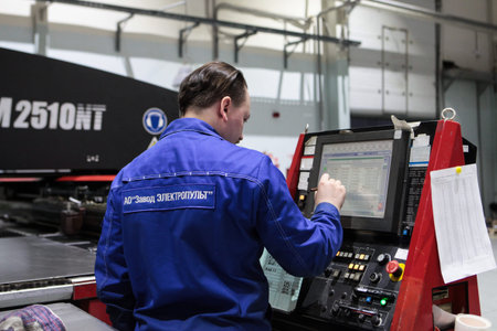 St. Petersburg, Russia - November 20, 2019: Electropult factory. An engineer at the monitor of a...