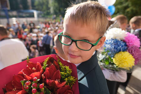 St. Petersburg, Russia - September 2, 2019: Solemn meeting of schoolchildren before the start of the school year. Clear sunny day. Beautiful lighting. Beautiful elegant childrenのeditorial素材