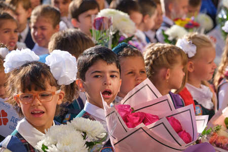 St. Petersburg, Russia - September 2, 2019: Solemn meeting of schoolchildren before the start of the school year. Clear sunny day. Beautiful lighting. Beautiful elegant childrenのeditorial素材