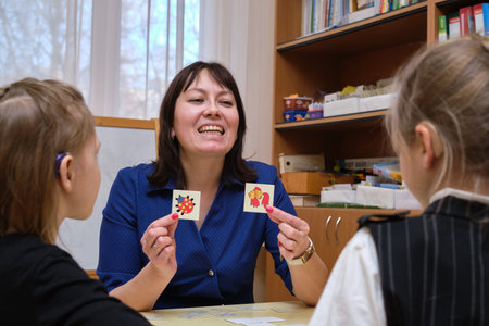 St. Petersburg, Russia - February 27, 2020: A speech therapist specialist conducts speech correction...