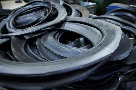 Automobile tires turned inside out, as industrial raw materials for processing at a rubber goods...