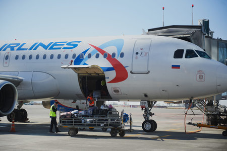 Saint Petersburg, Russia - October 22, 2019: Loading and unloading operations and baggage control at...