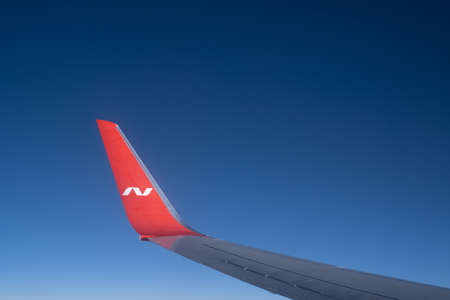 nordwind airplane wing with the emblem of the airline company against the skyのeditorial素材