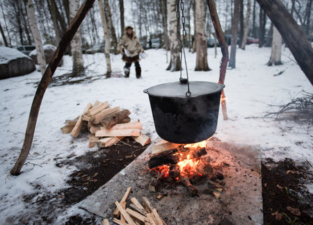 Cooking in a pot on the fireのeditorial素材