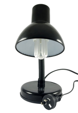 Black lamp with economic bulb over white surfaceの写真素材