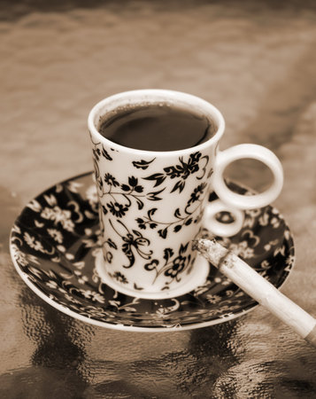 Cup of coffee with the cigaretteの写真素材