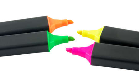 Four colorful markers isolated over white surfaceの写真素材