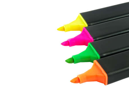 Four colorful markers isolated over white surfaceの写真素材