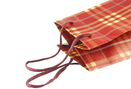 Closeup of brown present bag over whiteの写真素材
