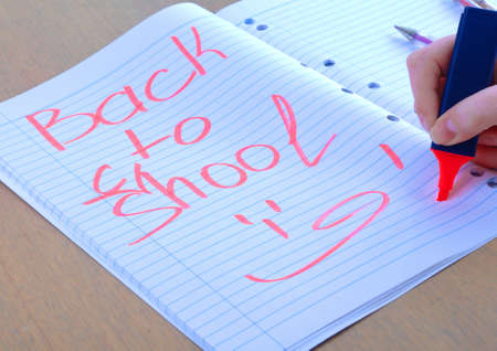 back to school written on notepadの写真素材