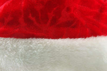 closeup of red christmas hat as a backgroundの写真素材