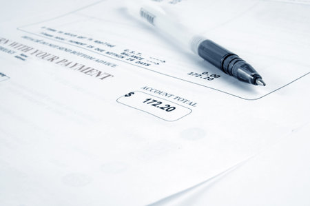 closeup of the bill and pen