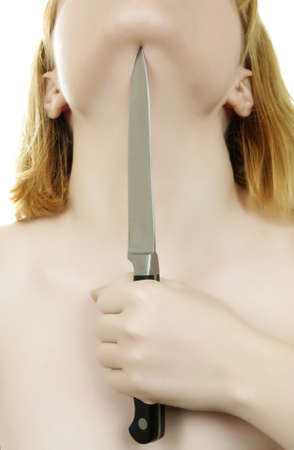 closeup of bare woman with knife の写真素材