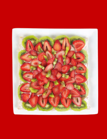 fruit cake closeup with strawberries and kiwiの写真素材