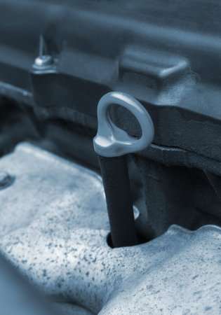 checking oil in the car.shallow DOFの写真素材