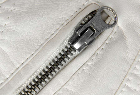white coat zipper macro closeup の写真素材