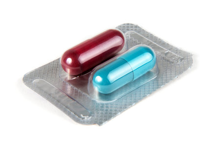 medicine pills over white surface