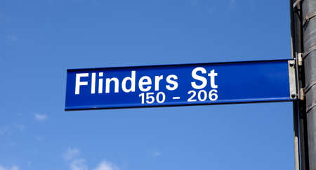 flinders street sign closeup in melbourneの写真素材