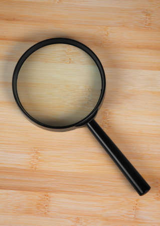 magnifying glass over the tableの写真素材