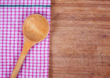 wooden spoon ovet textured wooden tableの写真素材