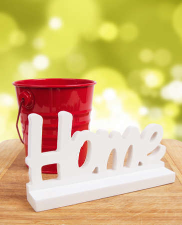 home sign with bucket.home conceptの写真素材