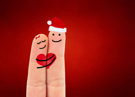 christmas romantic two fingers in loveの写真素材