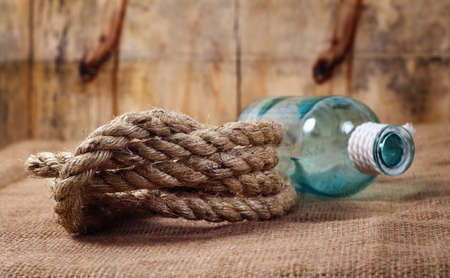 vintage objects,bottle and ropeの写真素材