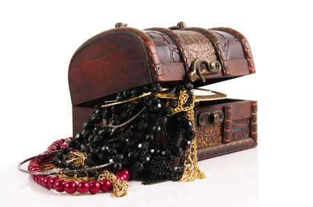 old treasure chest with jewelry  on whiteの写真素材