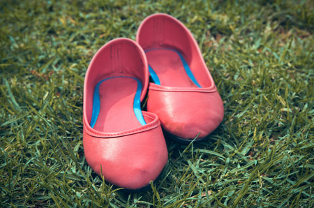 vintage female pink shoes outside